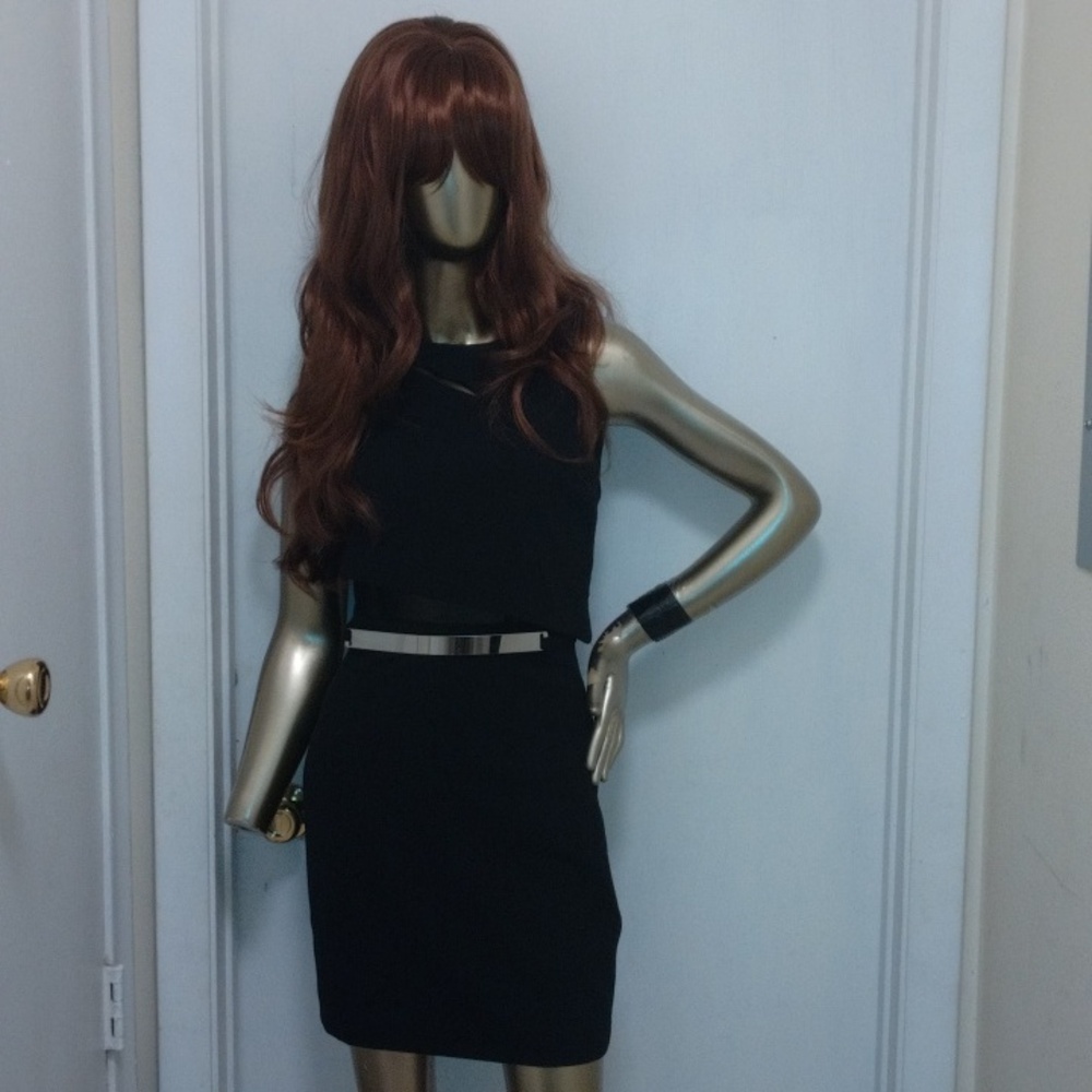 Guess This dress is a one piece with silver belt. It's A Nice Fashionable Slip
